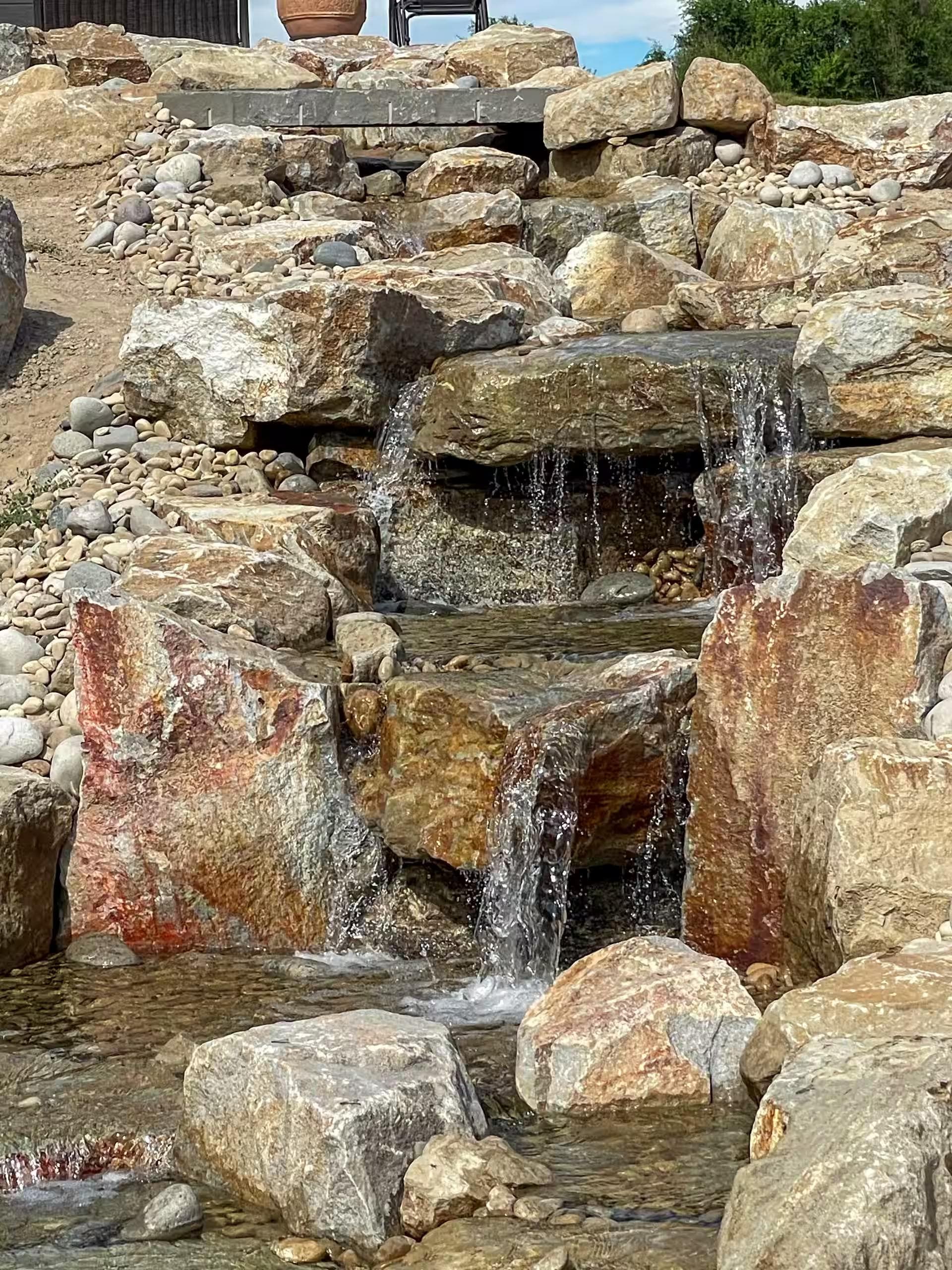 Water cascading down an outdoor water feature